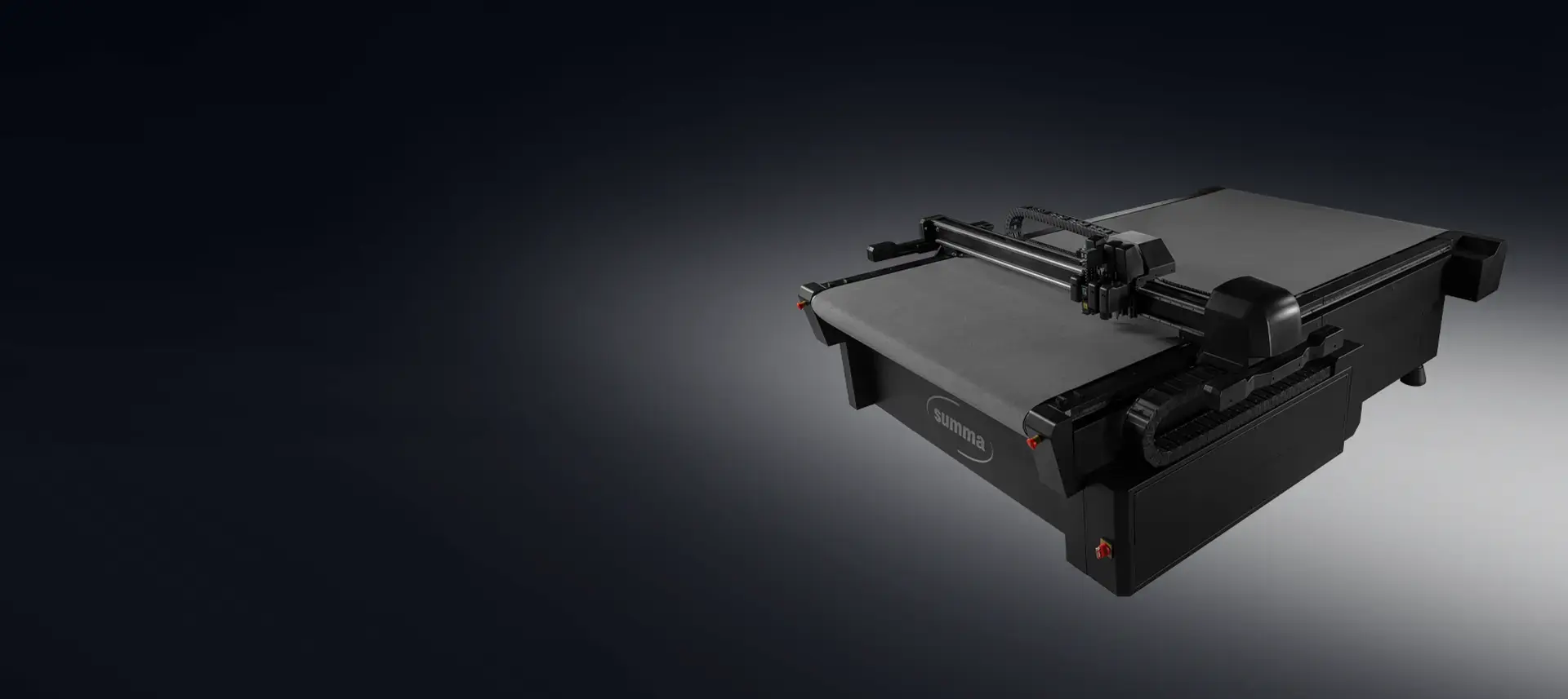 A Summa F Series Vantage flatbed cutter, showing the tool head and conveyor bed